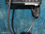 Shower with blue feather relief tiles